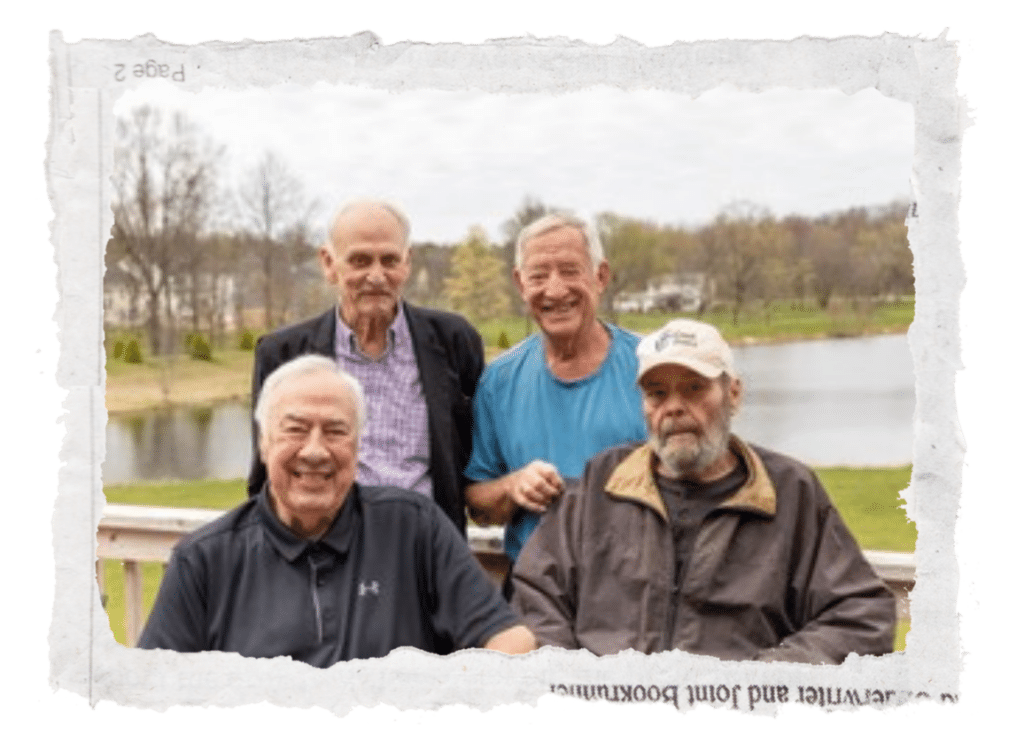 Michael Yaw standing with fellow Christian men outdoors